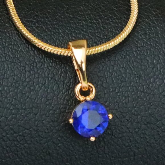 "Tiny Blue Stone Pendant in Gold Plated Brass – Elegant Minimal Detail, XPPT1762 - Picture 1 of 14